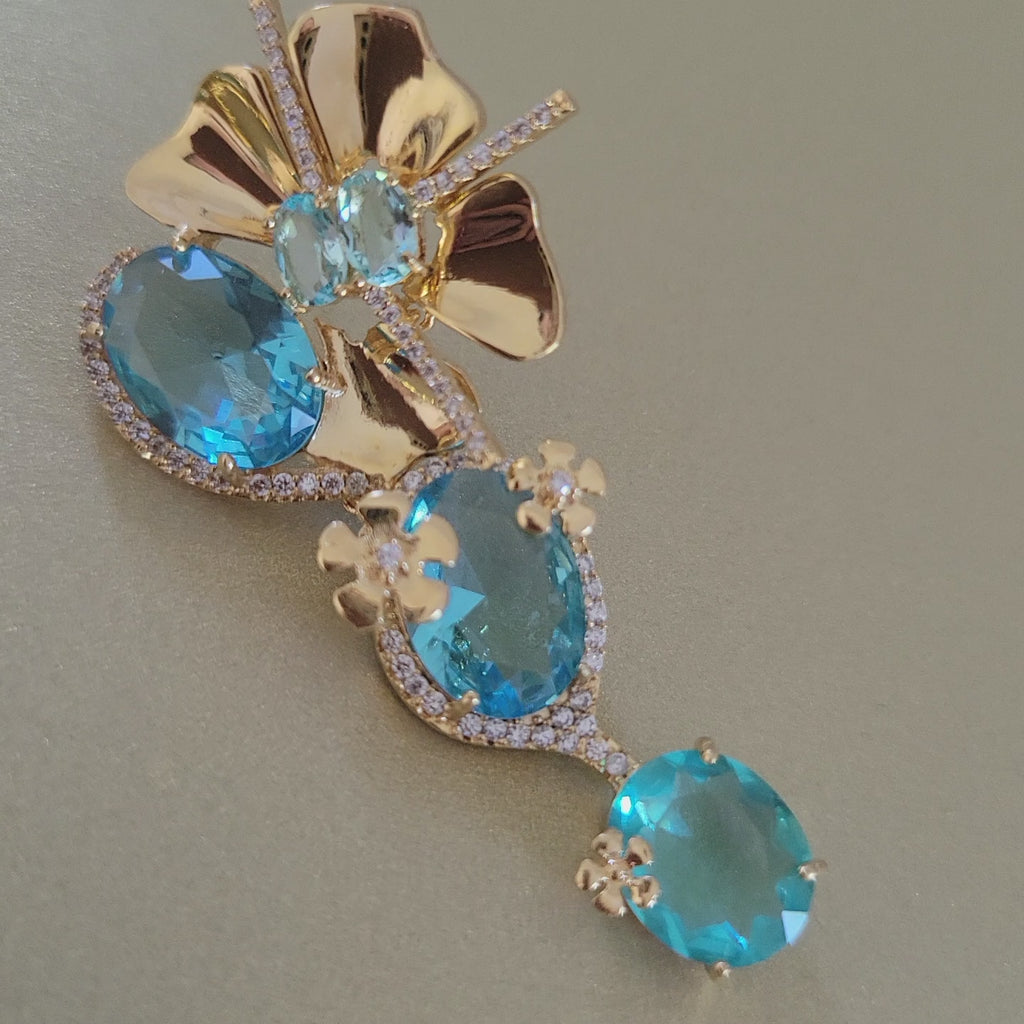 Flower Earrings 3 inches long with blue topaz crystals and cubic zirconias by Mcristals Statement Earrings